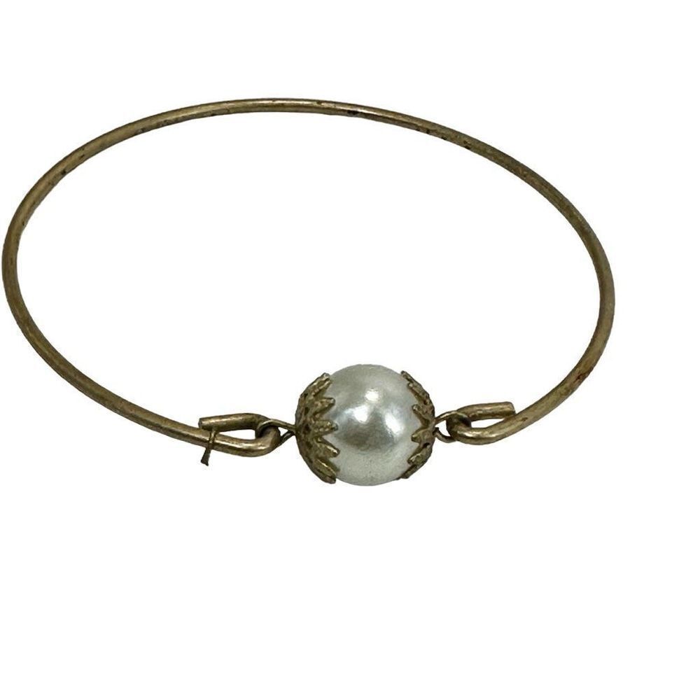 Gold tone faux pearl bangle bracelet